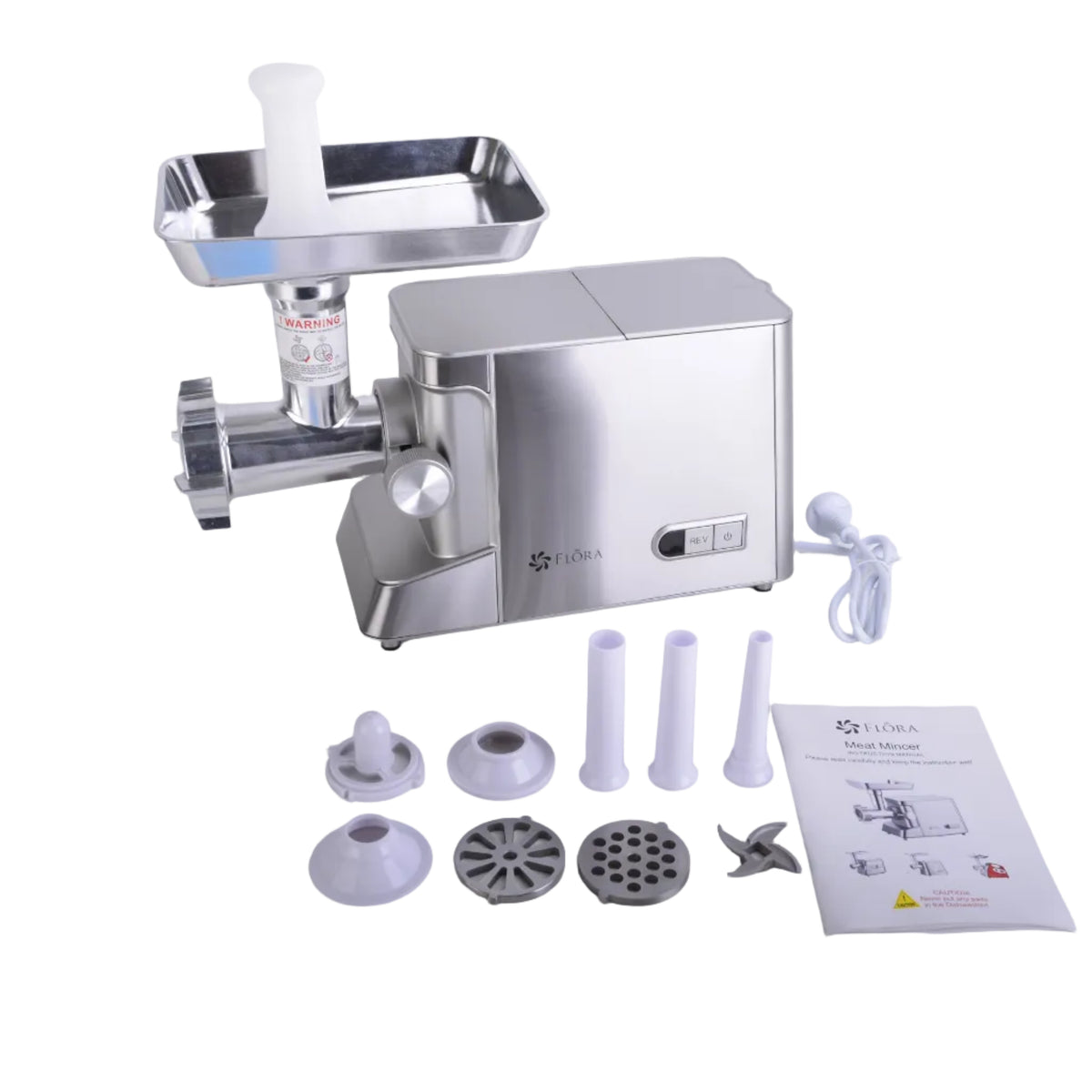 A stainless steel electric meat grinder with its accessories and manuals laid out on a light gray surface against a white background.
