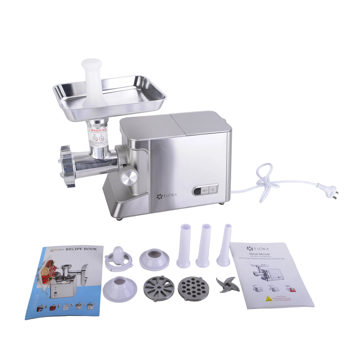 A stainless steel electric meat grinder with its accessories, including a power cord, manual, instruction booklet, and various mounting parts, arranged on a light gray surface against a white background.