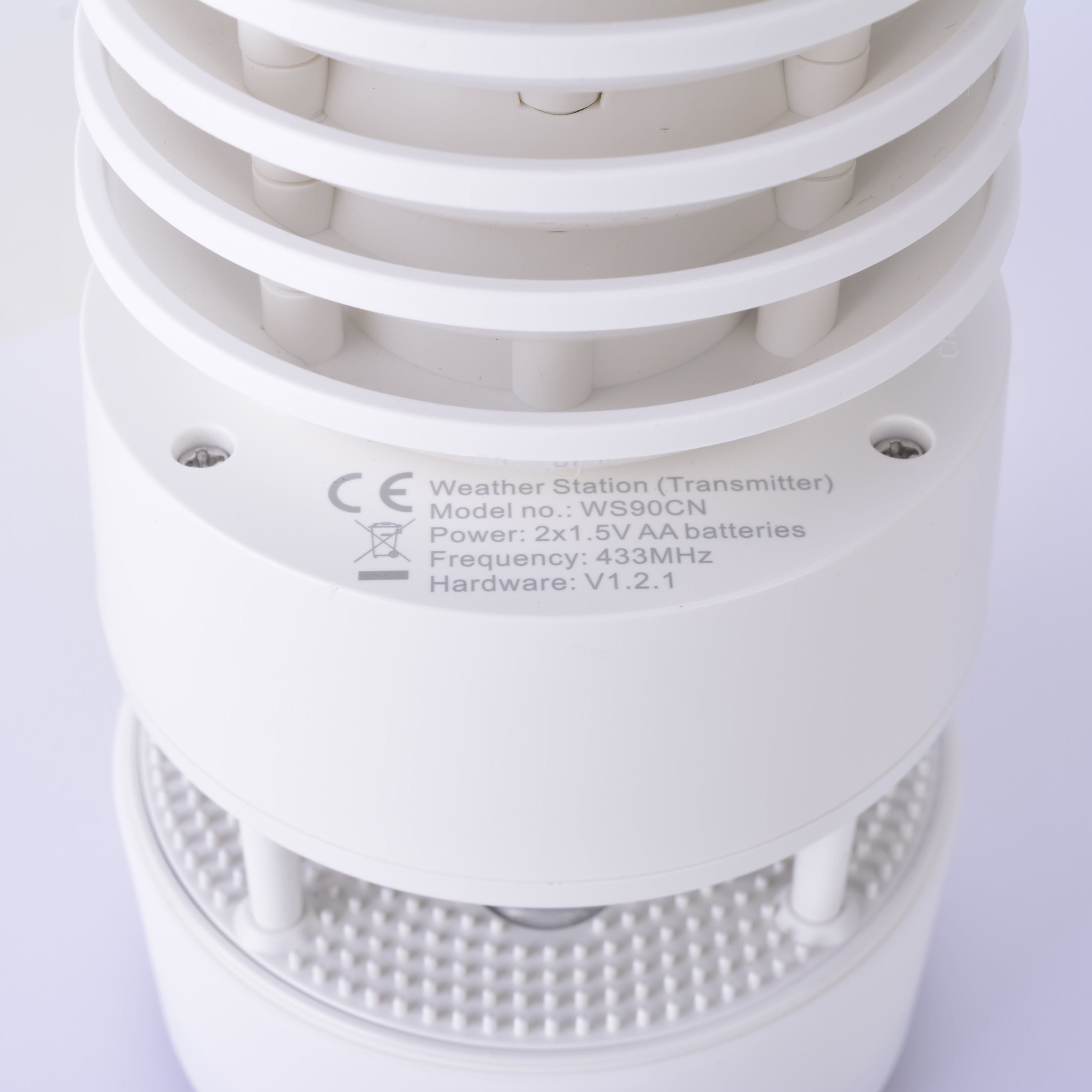 White electronic device with text on a white background